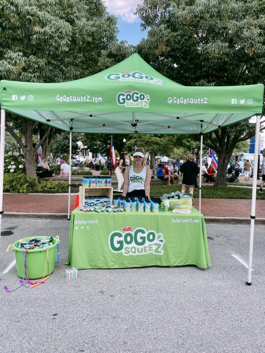 Tent and table with GoGoSqueez products